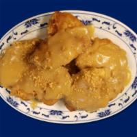 Almond Fried Chicken · Boneless chicken meat topped with gravy and deep fried.