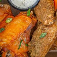 Chicken Wings  · (8ct) choice of buffalo, lillie q's bbq, or mole dry rub served with carrot and celery stick...