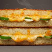 Jalapeño Popper · Aged cheddar, pepper jack, whipped cream cheese, and jalapeños.