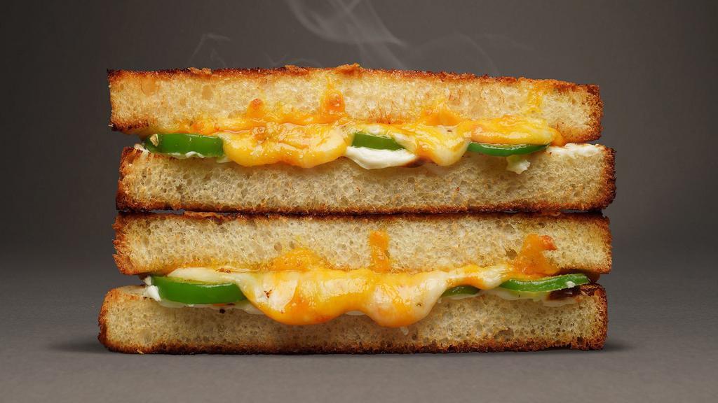 Jalapeño Popper · Aged cheddar, pepper jack, whipped cream cheese, and jalapeños.