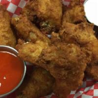 Chicken Wings (8) · 8 Wings breaded deep fried choice of up to 2 sauces