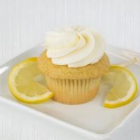 Lemon Doodle · White cake, snickerdoodle cookie baked on top with lemon buttercream.
