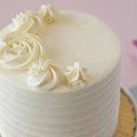 Marion Monroe · White cake, marionberry jam filling, vanilla buttercream.