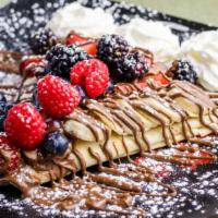 Crepe Town Special · Whipped cream, Nutella, bananas, strawberries, blueberries, powdered sugar.