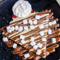 Marshmallow Crepe · Nutella or milk chocolate, melted marshmallow on the inside and outside, powdered sugar.
