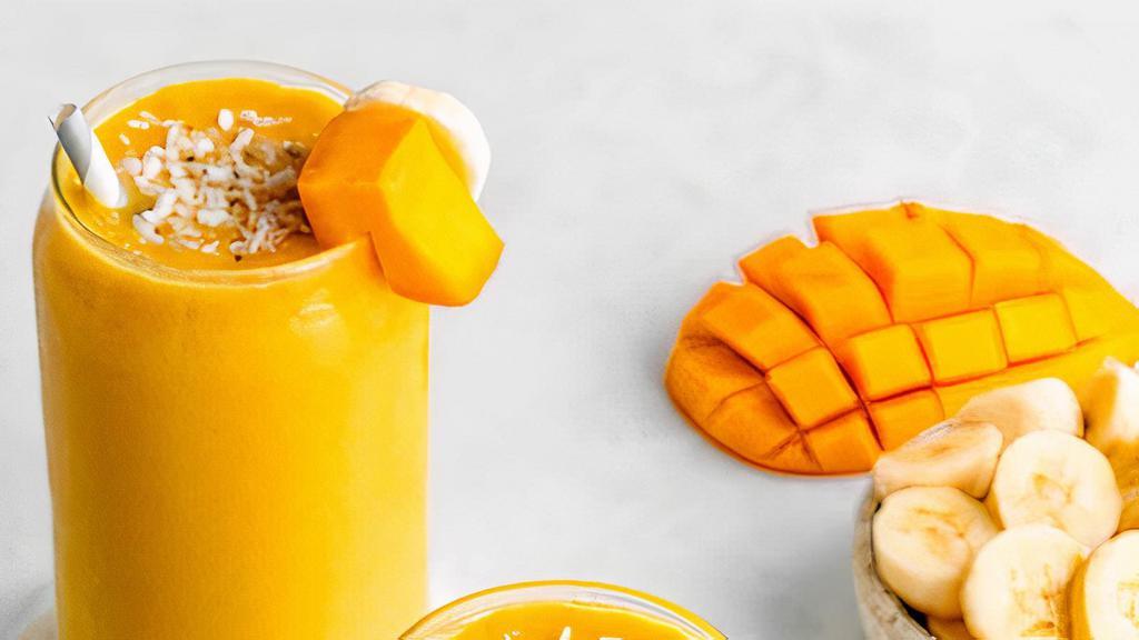  Mango Banana Smoothie  · Blend mangos, banana, vanilla yogurt, and milk in a blender until smooth.