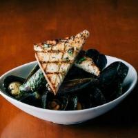 Pesto Mussels & Clams · white wine, fresh-caught mussels, clams homemade pesto. served w/ focaccia.