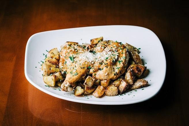 Roasted Lemon Chicken · all-natural free-range half a chicken, roasted yukon gold potatoes, lemon pan sauce, feta.