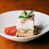Mama'S Tiramisu · a homemade coffee flavored layered cake, ladyfingers soaked in baileys and kahlua, topped wi...