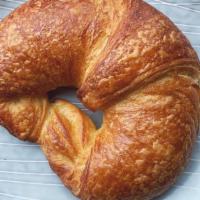 Butter Croissant · Flaky, buttery croissant layers baked until golden brown