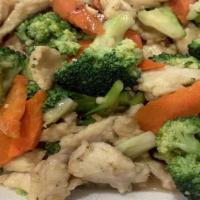 Chicken & Broccoli · Sliced white meat chicken with broccoli and carrots stir fried in a light garlic sauce.