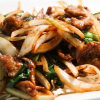 Spicy Mongolian Beef · Hot and spicy. Tender sliced beef with green and white onions stir-fried in a spicy Mongolia...