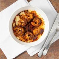 Shrimp & Grits · Shrimp and grits- shrimp and bacon sautéed in blackened butter and served over cheesy chedda...