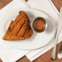 Catfish · Cornmeal breaded filet served crispy with our soul sauce.