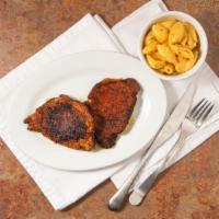 Blackened Pork Chop · Seasoned and seared chops served with our soul sauce.
