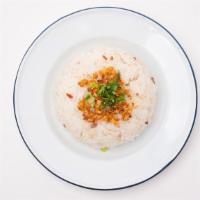 Side Seasoned-Garlic Rice (16Oz.) · House jasmine rice with fried garlic oil on top