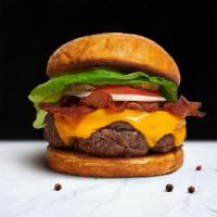 Wake & Bacon Burger  · American beef patty topped with melted swiss cheese, multiple layers of crispy bacon, lettuc...