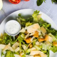 Caesar The First Salad · Romaine lettuce, house croutons, and parmesan cheese tossed with Caesar dressing.