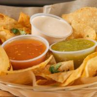 Chips Two Ways 'N Salsa Trio (Vegetarian) · Freshly fried corn AND flour tortilla chips served with a trio of our tomatillo, arbol, and ...