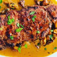 Marsala Sauced Steak  · Pan seared, house seasoned, brisk meaty flavored, tender, Halal New York steak with a baked ...