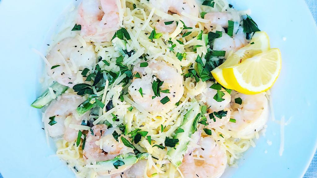 Prawns Alfredo Linguine · Handmade linguine tossed with sautéed wild caught prawns, chopped asparagus, minced garlic, shallots, and fresh herbs in a creamy, lemony, Parmesan alfredo sauce for a light feeling, sweet, sea salty, and soft cheesy flavor.