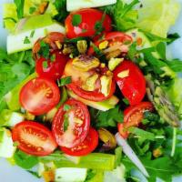 House Salad  · Crisp hearts of romaine tossed with wild arugula, fresh basil, chopped asparagus, sliced sha...