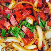 Onions And Peppers · Sweet Walla Walla onions, bright red bell peppers, and fresh herbs sautéed in olive oil, fin...