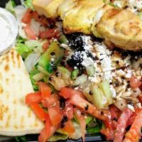 Greek Salad With Chicken Kabob - Regular Price · One Skewer Chicken Kabob Served on Lettuce, Tomato, Onion, Cucumber, Black olives, Half a pi...