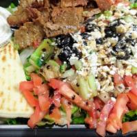 Greek Salad With Gyros - Regular Price · Gyros Meat Served on Lettuce, Tomato, Onion, Cucumber, Black olives, Half a pita, served wit...