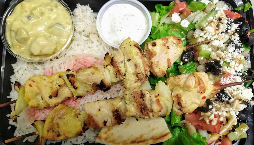 Chicken Kabob Plate - Regular Price · Two Skewers of Chicken Kabob Served with Basmati rice, Pita, Tzatziki Sauce and Choice of Side (Can be Made Dairy Free and Gluten Free Upon Request)