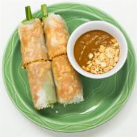 Vegetarian Salad Rolls (2) · Rice paper rolls with vegetables, shredded tofu and a side of peanut sauce.