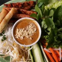 Vietnamese Pork Sausage · Grilled honey marinated Vietnamese pork sausage and crispy shrimp sticks. Served with rice p...