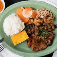 Special Rice Combo · Pork chop, grilled honey lemongrass pork and shrimp, dried shredded pork, and egg and pork p...