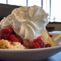 Strawberry Waffle · Our delicious buttermilk waffle topped with a generous amount of strawberries topping and wh...