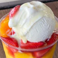 Raspado With Ice Cream · Build your own raspado: choice of handcrafted syrup, fruit and ice cream.