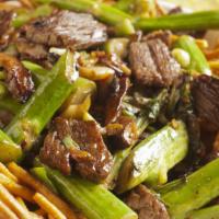 The Beef Chow Mein · Shredded beef mixed with fresh mushrooms and vegetables, served with fried noodles.