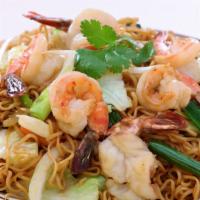 The Shrimp Chow Mein · Shrimp mixed with fresh mushrooms and vegetables, served with fried noodles.