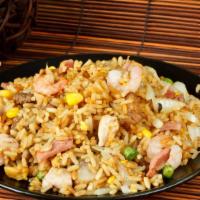 The House Fried Rice · Traditional fried rice stir-fried and loaded with tender beef, seasoned chicken, and shrimp ...