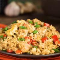 The Chicken Fried Rice · Traditional dish of steamed rice stir-fried with soy sauce, egg, seasoned meat, and fresh ve...