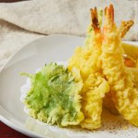 Tempura · Lightly batter-fried prawns, white fish, and seasonal vegetables, served with tempura sauce.