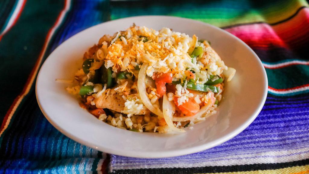 Rosita'S Fiesta Bowl · Start with a bed of delicious Spanish Rice and create your own FIESTA BOWL with Pico de Gallo, sour cream, and white cheese on top.