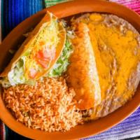 Enchilada · Cheese, Spinach, Chicken, or Beef enchilada with your choice of sauce.
