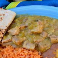 Red Chile Or Green Chile Dinner · Choose Red or Green Chile Beef or Green Chile Pork. Served with Spanish Rice, Refried Beans,...