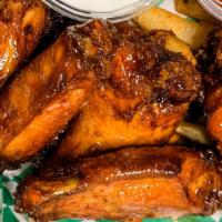 Chicken Wing 12 Pc · 12 pc beer-brined naked wings & your choice of sauce: buffalo, teriyaki, sweet chili, hot ho...