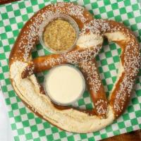 Large Pretzel  · Salted & served with queso cheese & stone ground mustard.