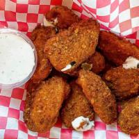 Jalapeno Poppers · Filled with cream cheese and jalapeno, fried to perfection.