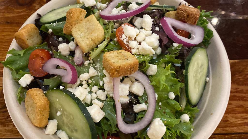 Nbw House Salad · Mixed greens, cucumber, tomatoes, feta, croutons with house vinaigrette dressing.