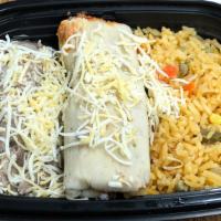 Beef Tamale Meal · Beef tamale with re-fried beans and rice topped with cheddar cheese.