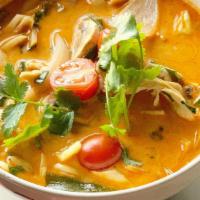 Tom Kah:* (Vg) · Spicy coconut milk soup with galanga root, kaffir leaves, lemongrass, tomatoes, onions, mush...