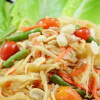 Papaya Salad Vegan:* · Most famous Thai spicy green papaya salad, green bean, tomato, fresh chili, and garlic in ho...